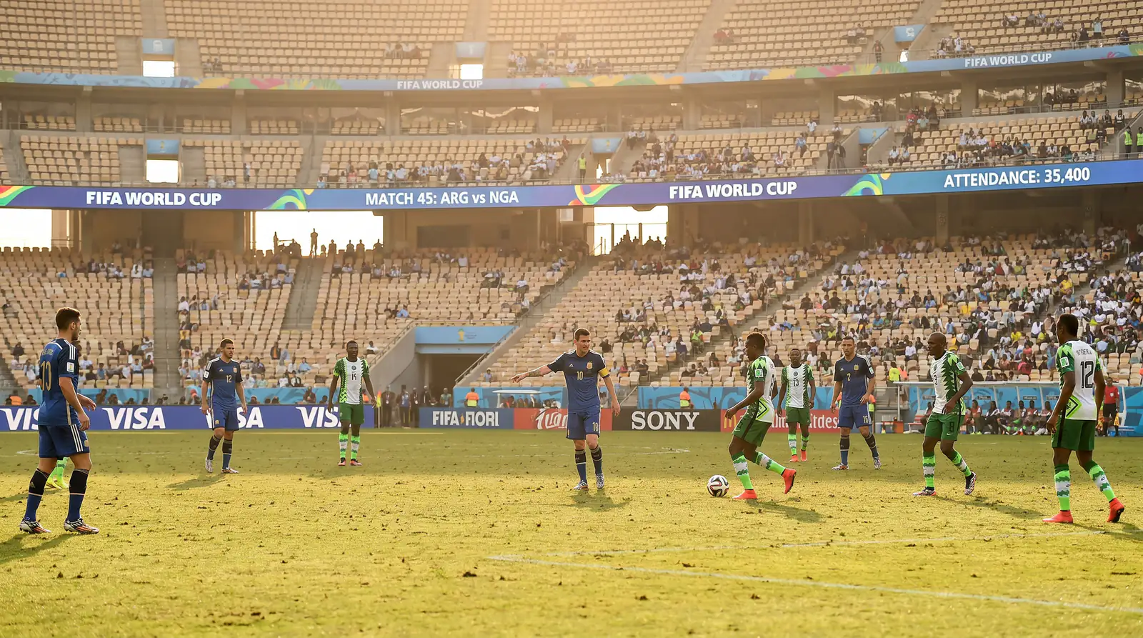 Two teams playing a cautious tactical World Cup group match with defensive formations visible